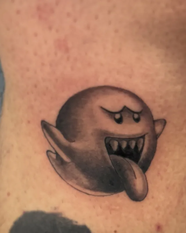 Black and grey Boo ghost tattoo